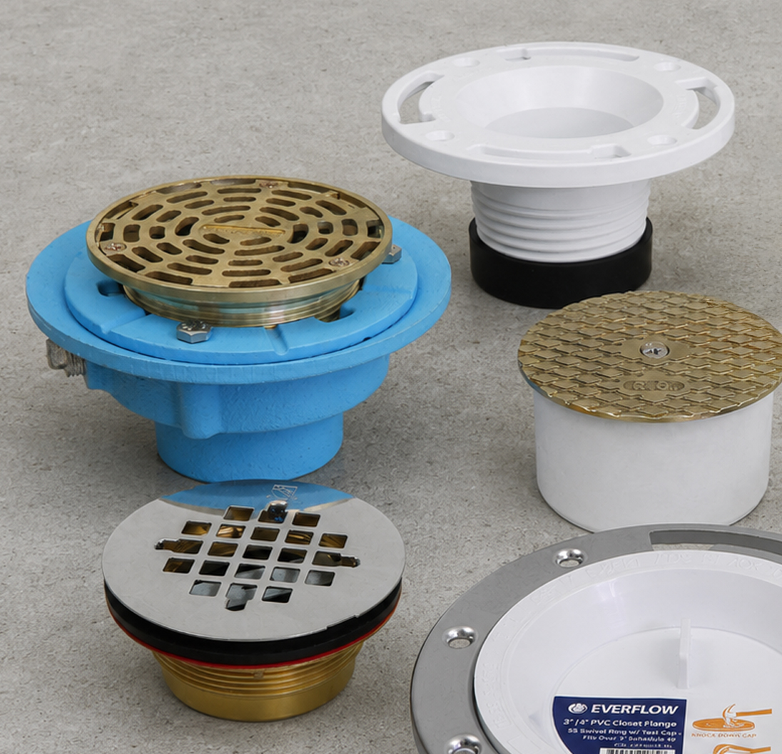 Assortment of Everflow residential and commercial floor drains and strainers.