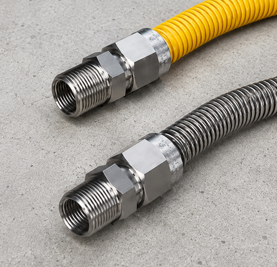 Flextron yellow-coated and stainless steel flexible gas connectors.