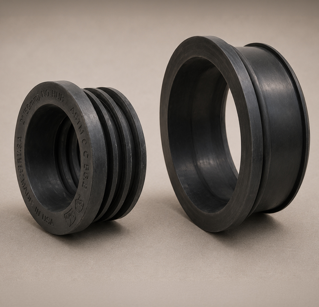 Black rubber pipe gaskets for plumbing and DWV systems.