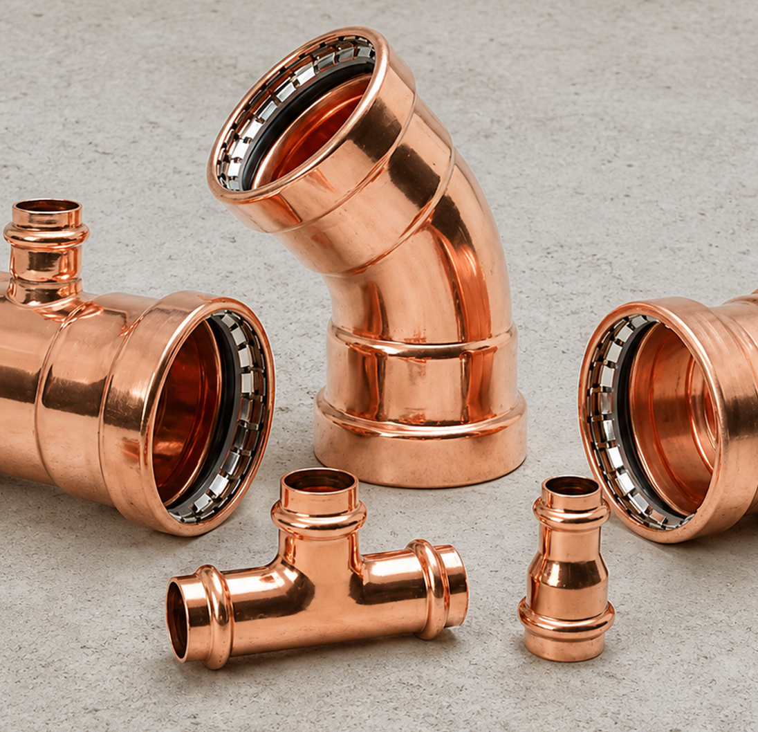 Copper press fittings including elbows, tees, couplings and reducers.