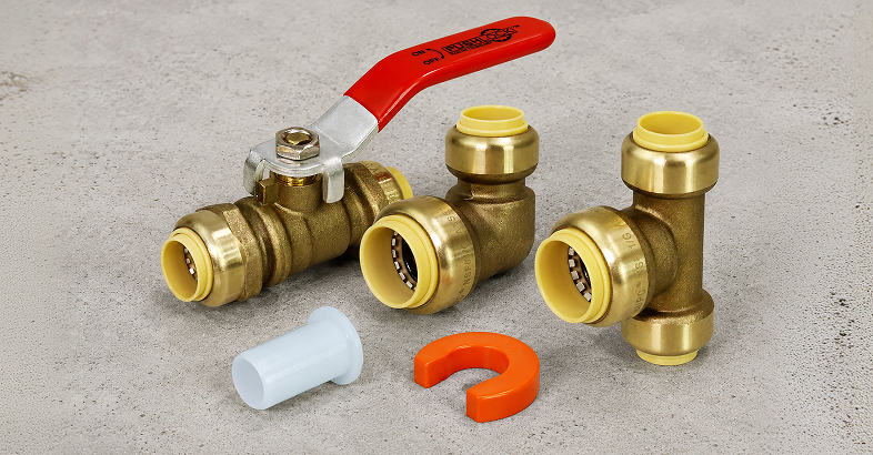 PushLock logo over brass push-fit plumbing fittings, valve and removal tools.