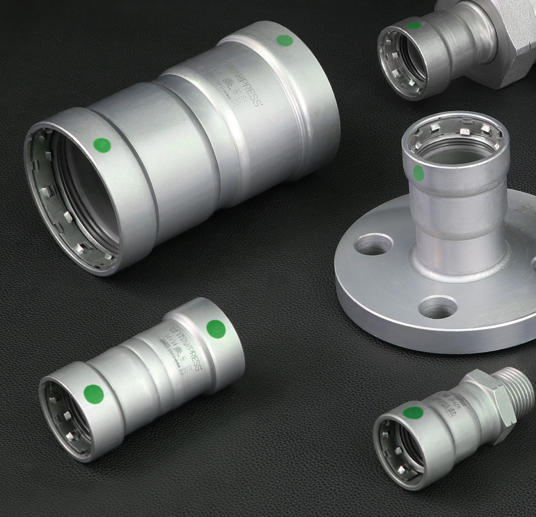 Titanpress mechanical press fittings and flange with green sealing elements.