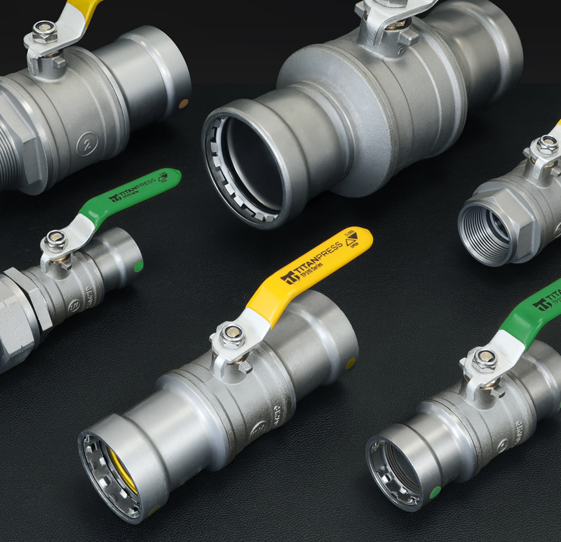 Assortment of Titanpress carbon steel press valves with colored handles.