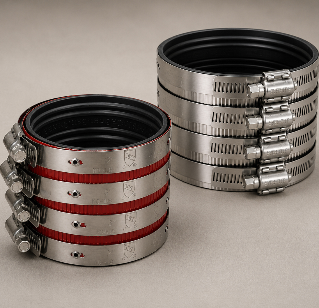 XH no-hub couplings with stainless steel shields and gear clamps.