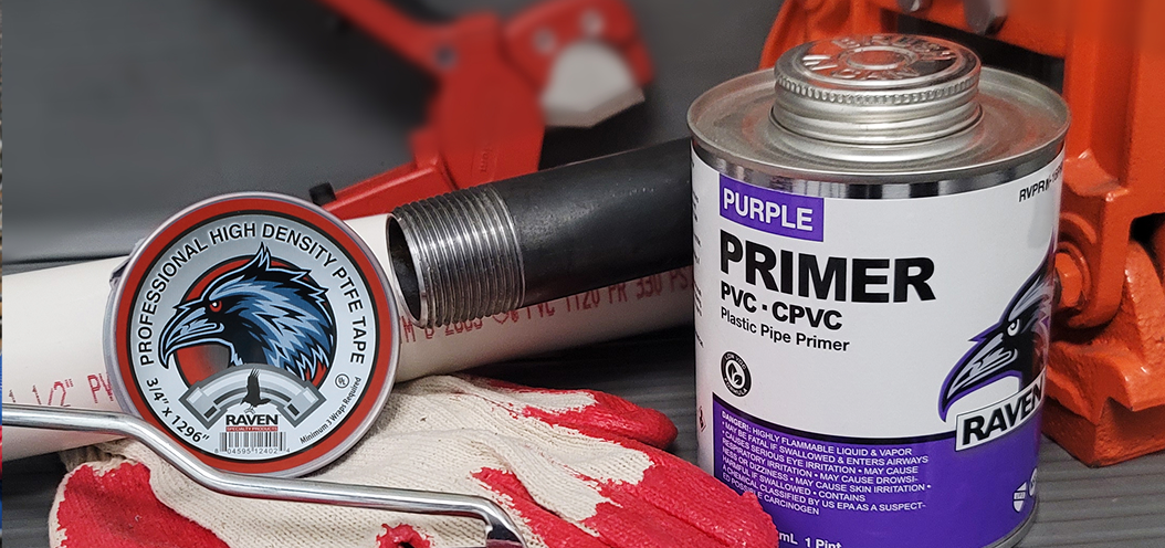 Raven purple PVC and CPVC primer with pipe and professional plumbing tools.