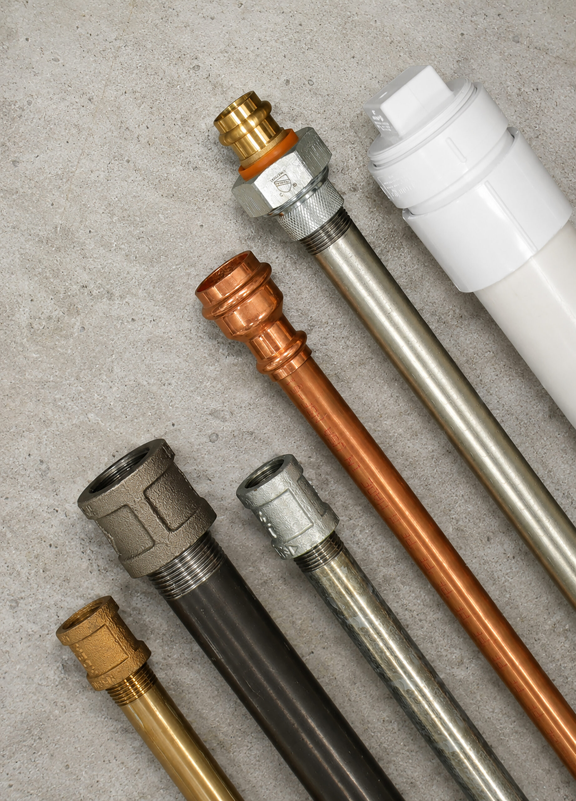 A variety of Everflow fittings and nipples in various sizes and types.