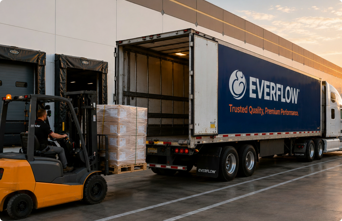Everflow delivery truck being loaded with a pallet of boxed plumbing products.